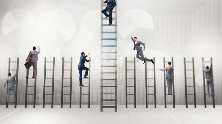 Business competitors in suits climbing the ladder
